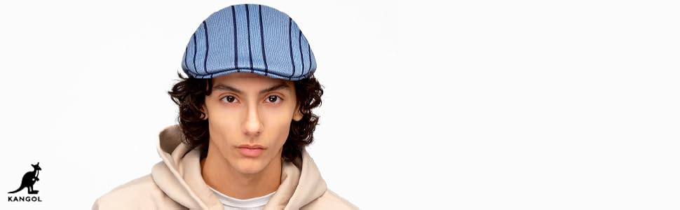 Model in a striped blue flat cap for men.