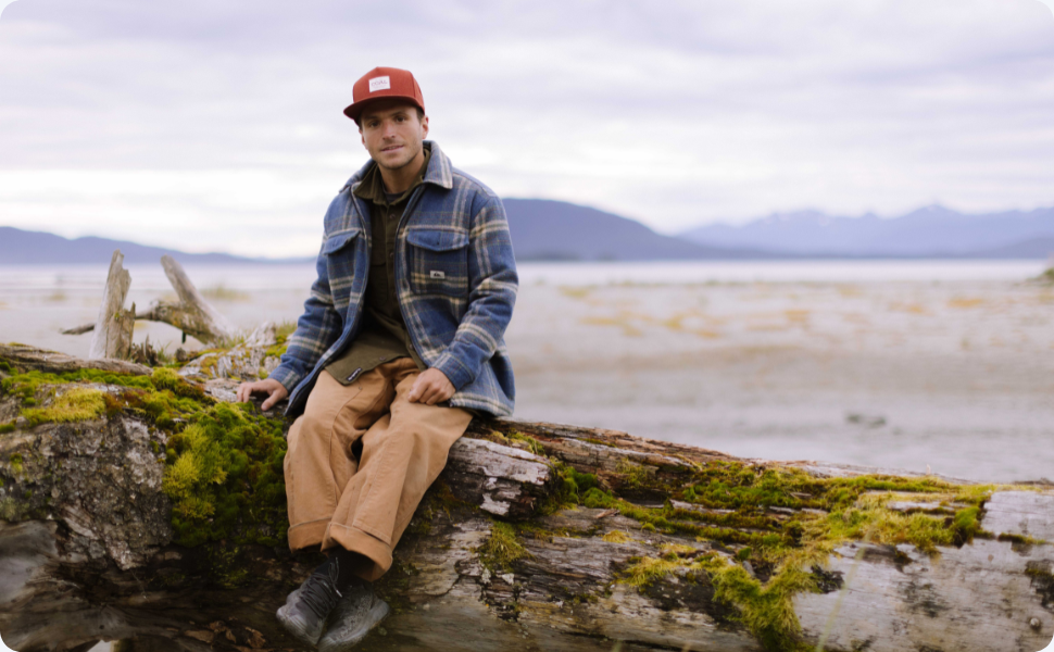 Uniform cap with guy in the rocks. Provo, hauler, Bridger, Tracker