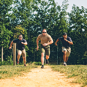 three men running