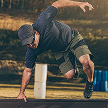 man running in shorts