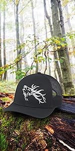 a elk trucker hat in a colorful sunny forest scene autumn season with yellow trees clear day