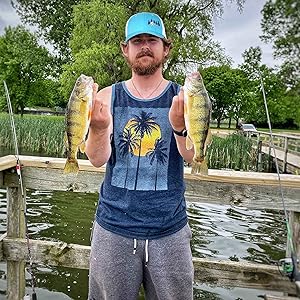 a men wearing a trucker hat showing fish