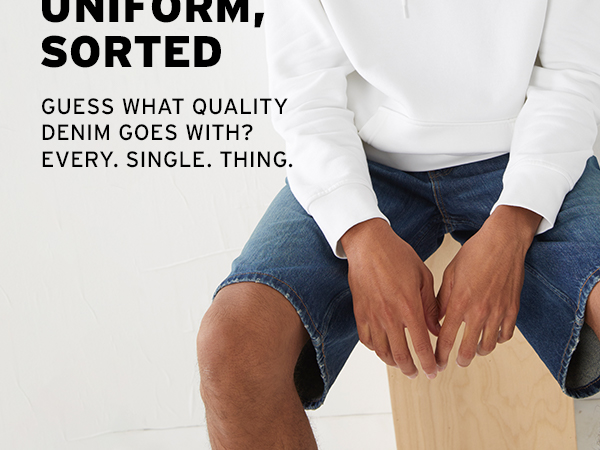 waist down image of black male model in a white levis hooded sweatshirt