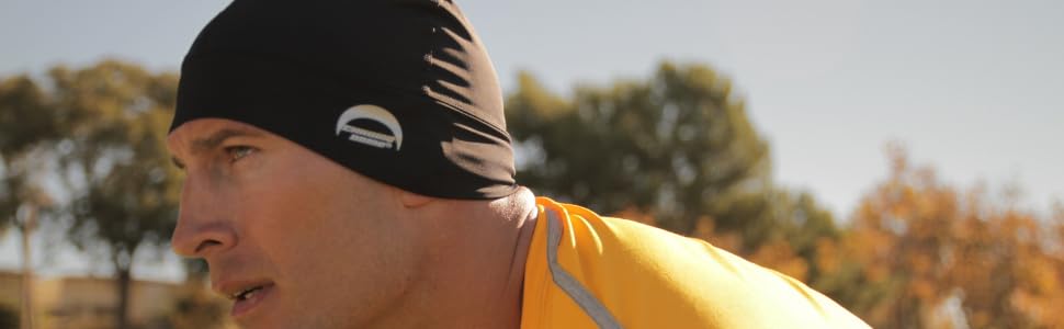 Man wearing a black UV Protection skullcap to protect his head neck and ears from harmful UV rays.